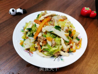 肉丝包心菜炒年糕的做法步调：11