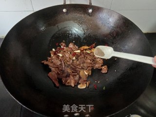 干炒牛肉的做法步调：7