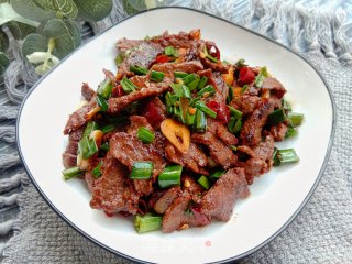 干炒牛肉的做法步调：12