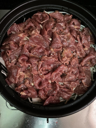 金针菇牛肉煲的做法步调：8