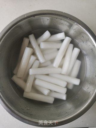 牛肉辣利剑菜炒年糕的做法步调：5