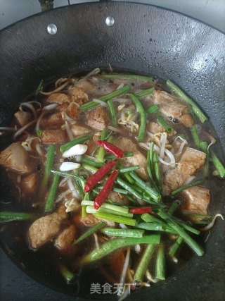 豆角五花肉焖里的做法步调：7