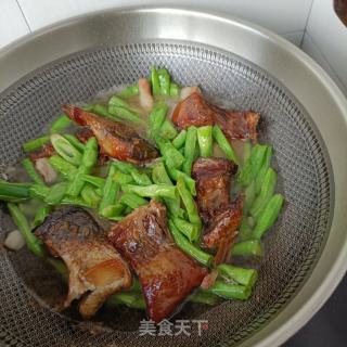 豇豆角炖腊鱼的做法步调：13