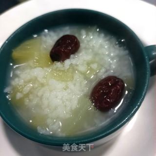 雪莲果年夜米粥的做法步调：10