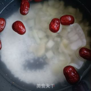 雪莲果年夜米粥的做法步调：7