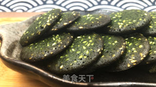 抹茶芝麻薄坚饼，酥酥坚坚，做法简朴，越嚼越喷鼻。的做法步调：11