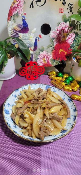牛柳炒酸萝卜条的做法步调：12