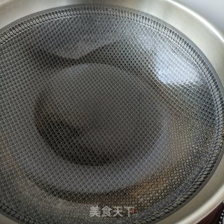 酸萝卜炖年夜鹅的做法步调：9