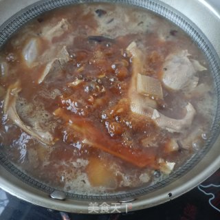 酸萝卜炖年夜鹅的做法步调：17