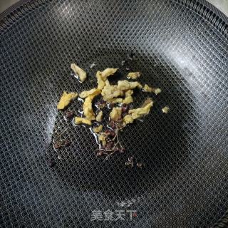 莴笋丝炒油渣的做法步调：5