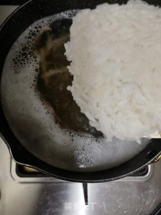 干鱿剥皮鱼粥的做法步调：7