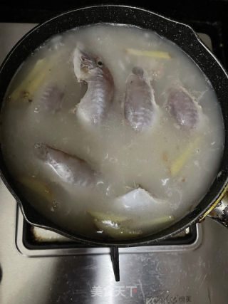 干鱿剥皮鱼粥的做法步调：12