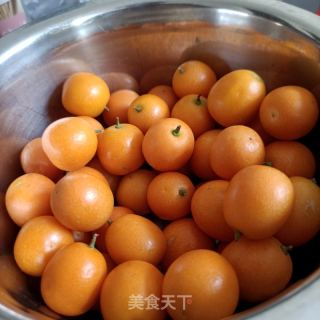 金桔蜜饯的做法步调：1