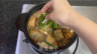 鲈鱼豆腐煲的做法步调：16