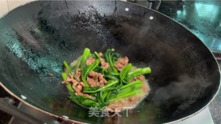 菜心炒牛肉的做法步调：12